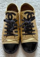 Chanel goldene Sneakers, Leder
