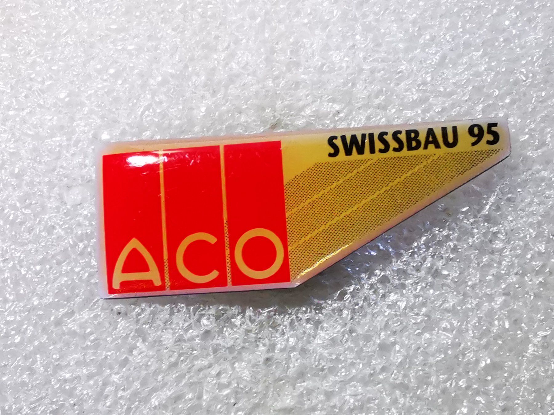 Placchette & Badge: Ansteckpin 38: Aco Swissbau – Usato da Oppligen venduto da Pin-Fall-Shop