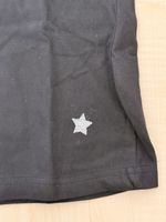 Vintage Schwarzes Poloshirt mit Glitzerstern