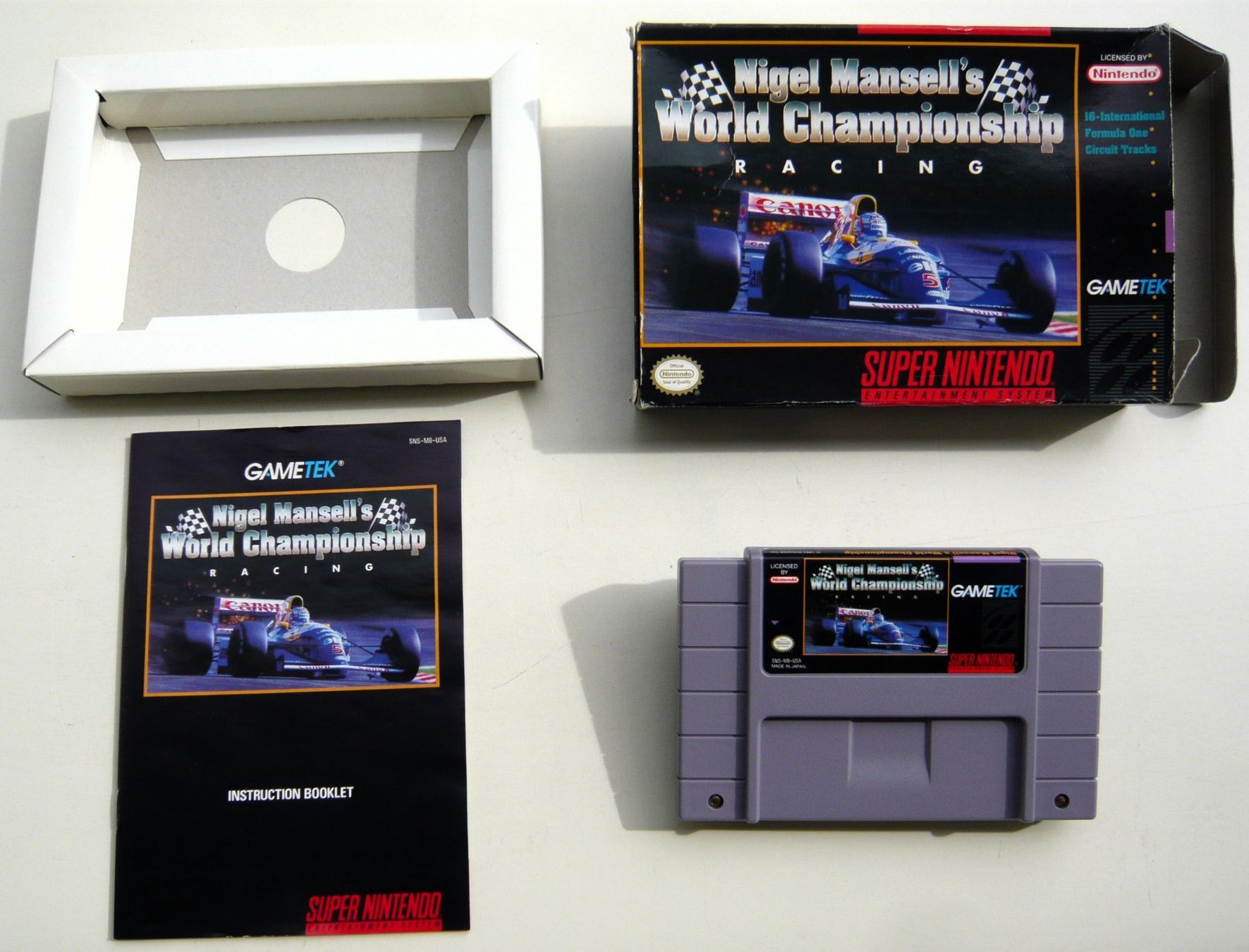 Nintendo Giochi: SNES: - Nigel Mansell's World Championship, Boite + Notice – Usato da Onex venduto da Jaguar1986