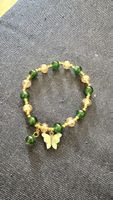 Armband mit Perlen und Schmetterling Anhänger 