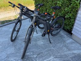 2x Smart E-Bike (1x voll funktionstüchtig / 1x Akku defekt)