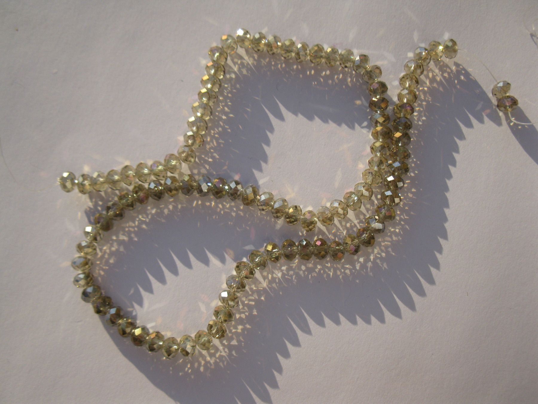 Perle (finte): 1 Strang Glasperlen 6x4mm champagner AB – Nuovo e nell'imballaggio originale da St. Margarethen TG venduto da LuanaKa 1