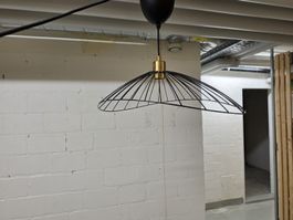 Hanging lamp black metal wire frame design brass detail