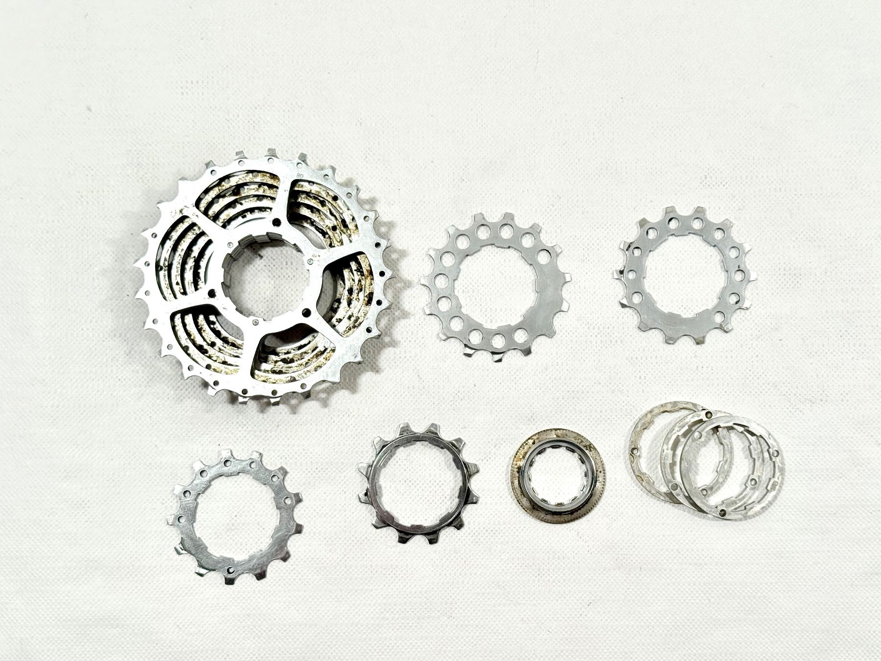 Cassette Shimano CS-HG70-9 9 Vitesses 11-34t – VTT / Touring – état Neuf (très Peu Roulé)
