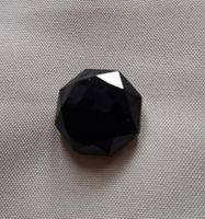 Schwarzer Glasknopf achteckig facettiert, 22 mm.