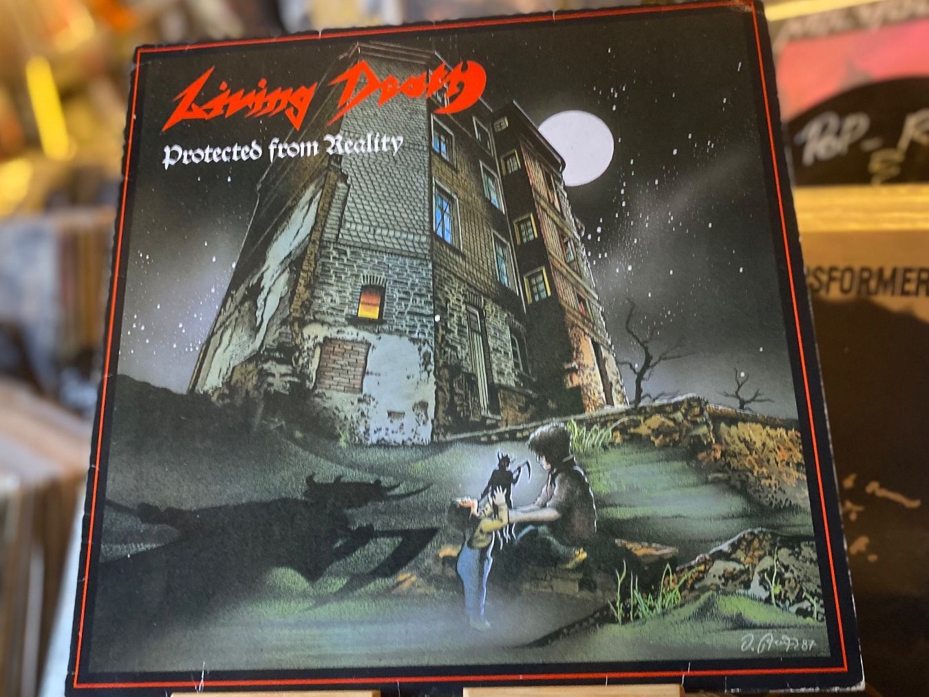 Schallplatten: LIVING DEATH - PROTECTED FROM REALITY..OG GER 1987...VG+/VG+ – Gebraucht aus Gals von Diskopatshop
