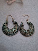Belles boucles d'oreilles ethniques bleues et dorées