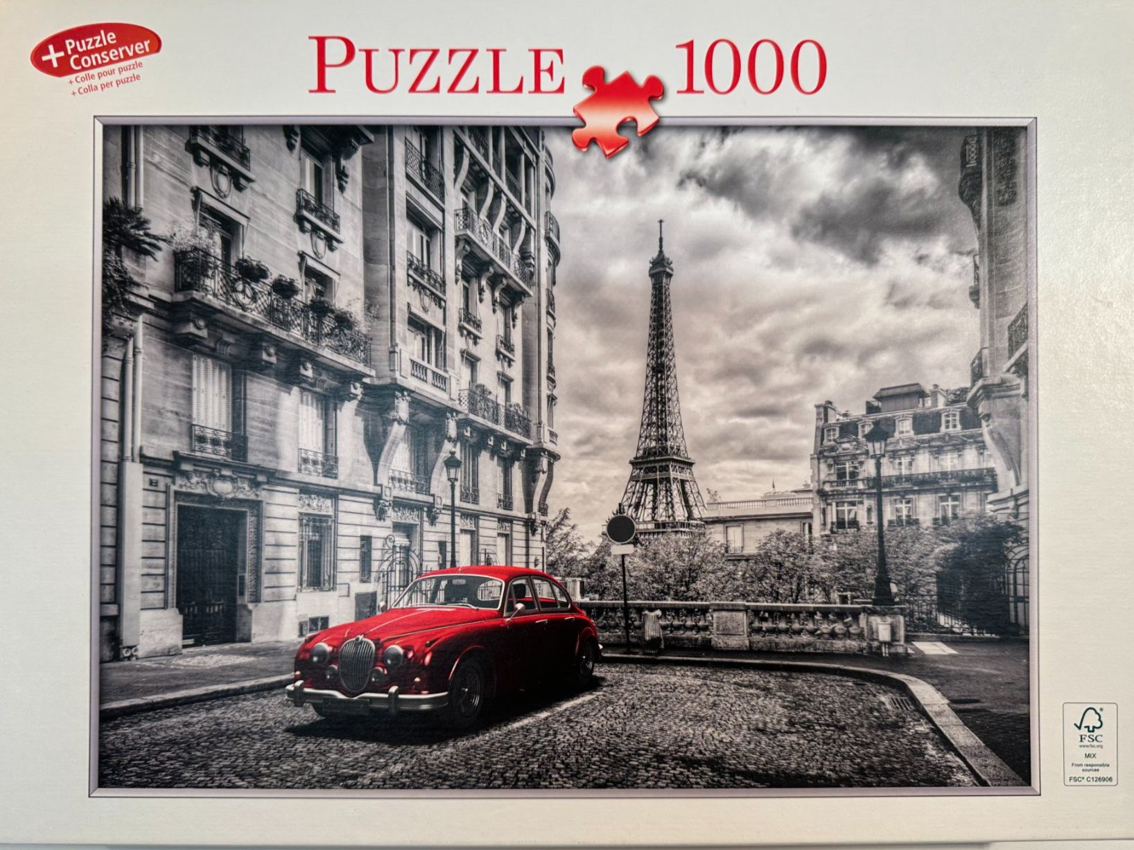 Ravensburger Puzzle: Ravensburger Puzzle. Eifelturm mit roter Limousine  1000 – Usato da Dürnten venduto da RaschaKatz