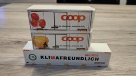 Containers Migros et Coop.