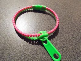 Armband Reissverschluss grün/rosa
