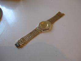 Swatch Skin Paved SFK 127 Ultra Flach Damen Vollvergoldet