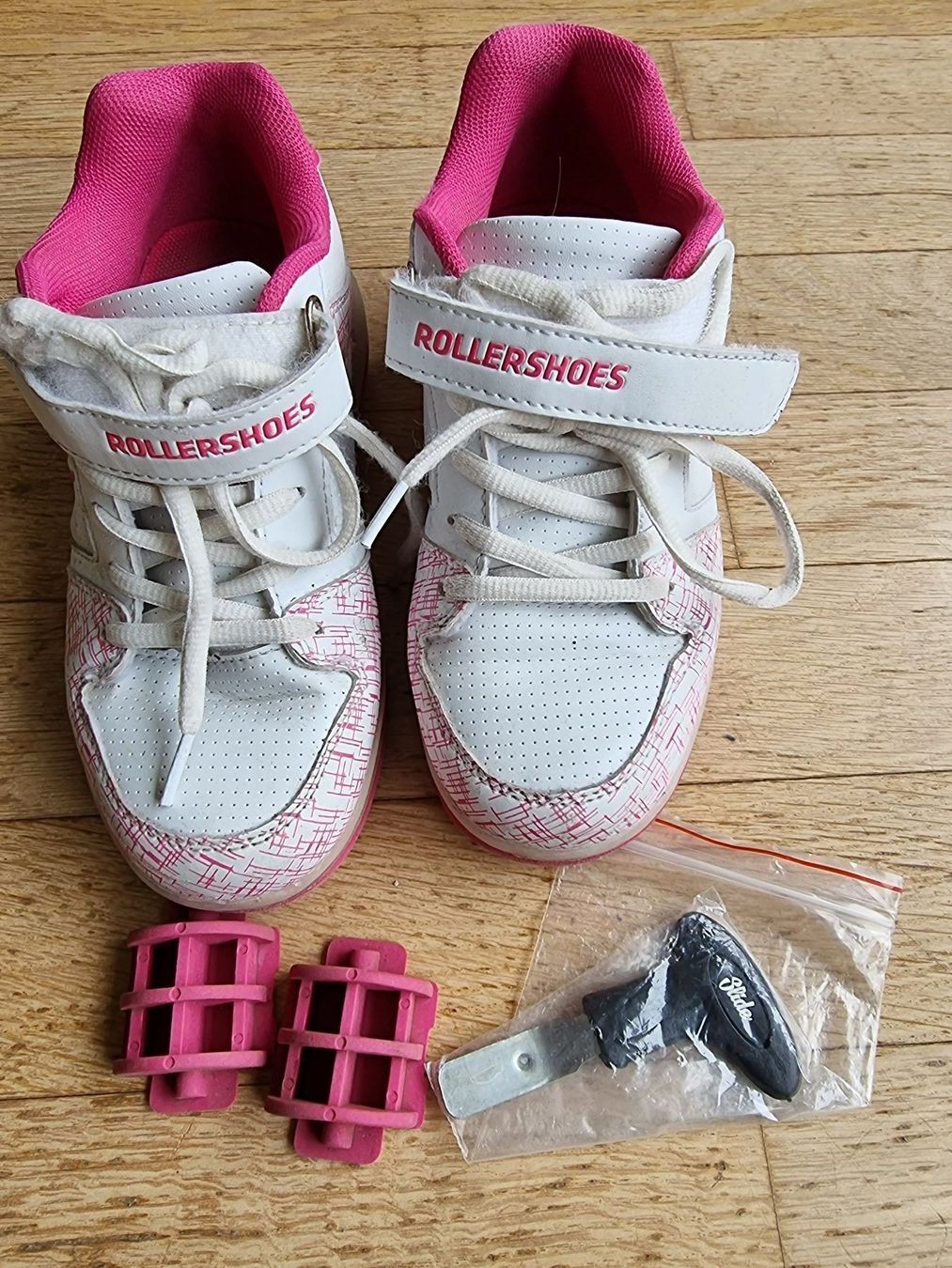 Scarpe per ragazzi: Rollershoes Slide weiss/rosa Gr. 32 – Usato da Buchrain venduto da Xaro01