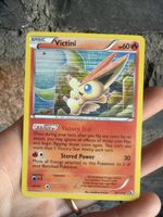 Victini 23/113 Tomokazu Komiya