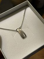 Collier argenté de chez Christ