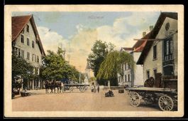 AK Müllheim, Ortspartie mit Wohnhäusern und Pferdegespannen