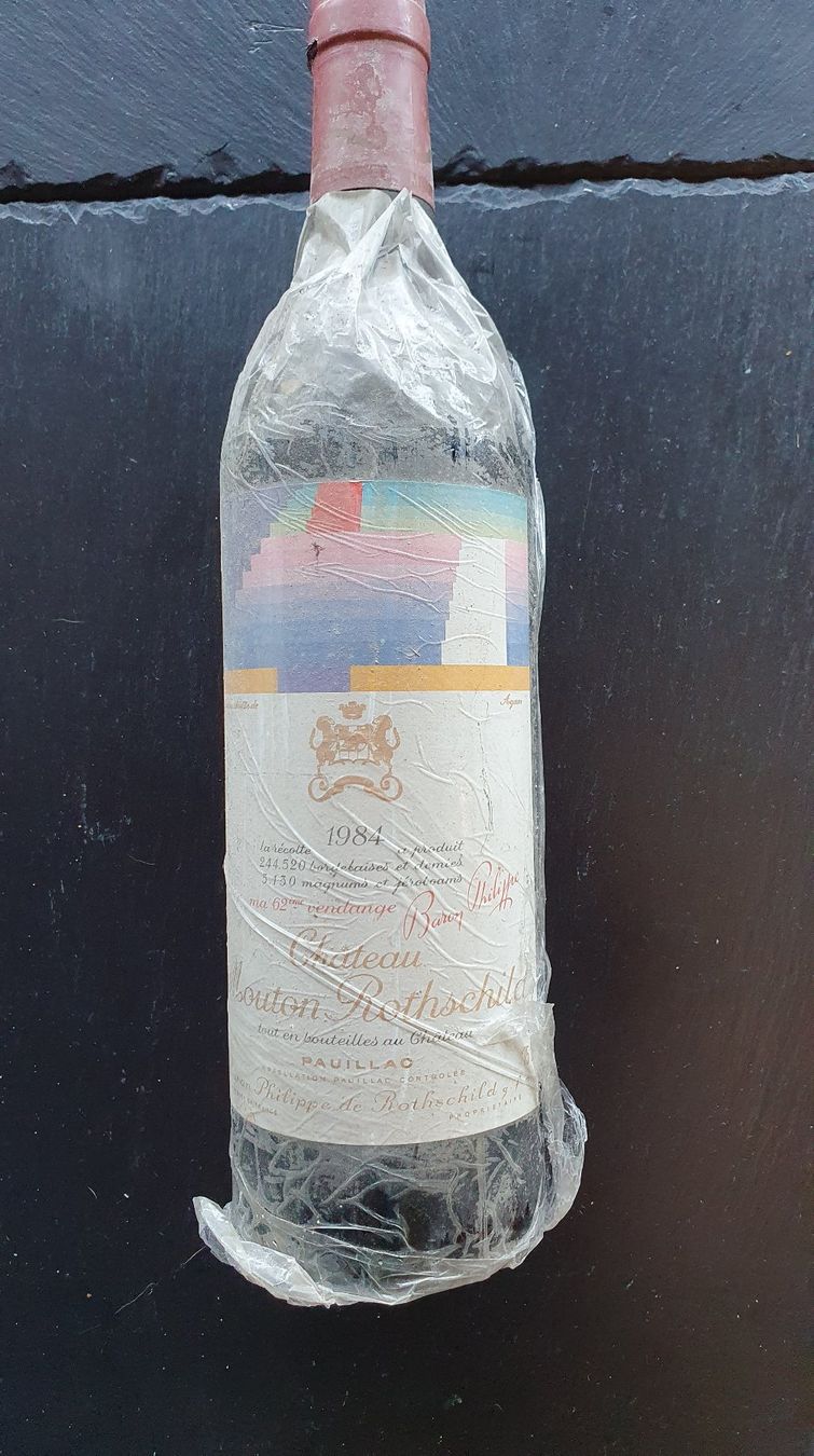 Mouton Rothschild Vino: Château Mouton Rothschild 1984 – Nuovo e nell'imballaggio originale da Dickbuch venduto da Dixieonly