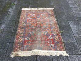 Antiker stark abgelaufener Teppich