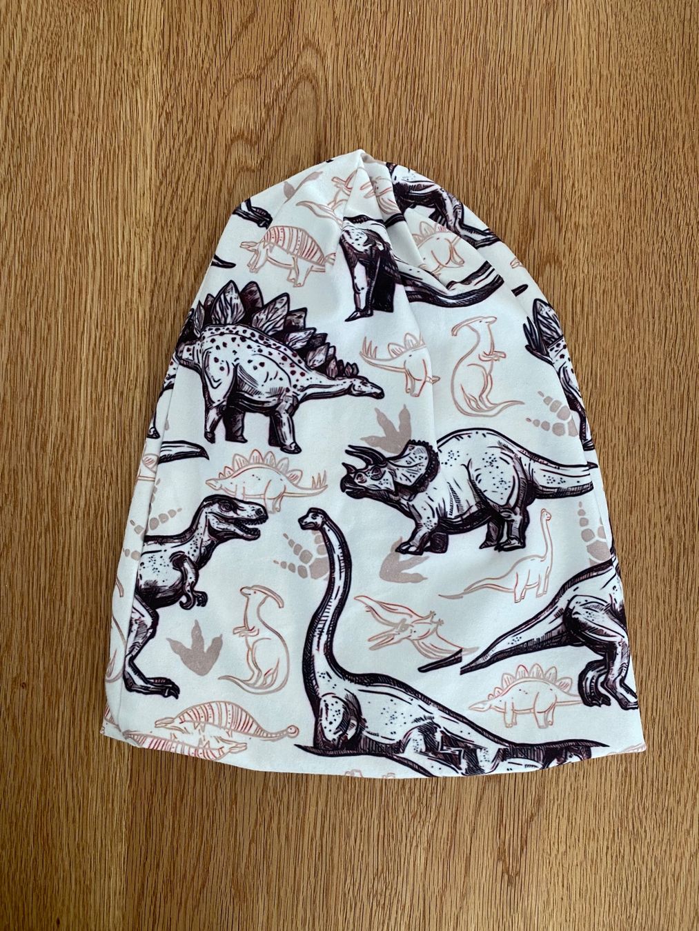 Copricapi, berretti & cappellini: Cool Dino Beanie, Jersey, Neu, onesize – Nuovo (secondo la descrizione) da Einsiedeln venduto da PaedeK84