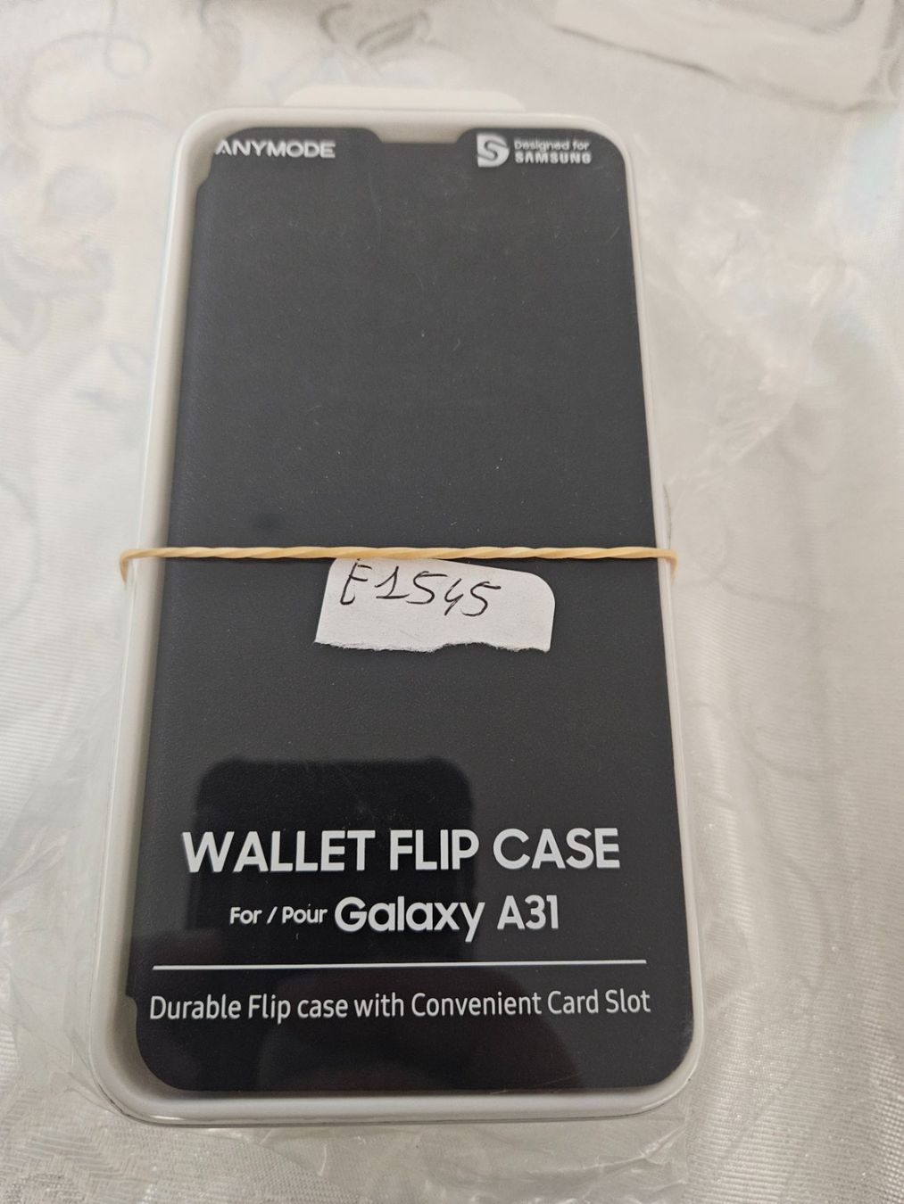 Cover & Protezioni schermo: Samsung Etui Clear View Coque Noir Galaxy A31 – Nuovo e nell'imballaggio originale da Valentigney venduto da OrigineProd