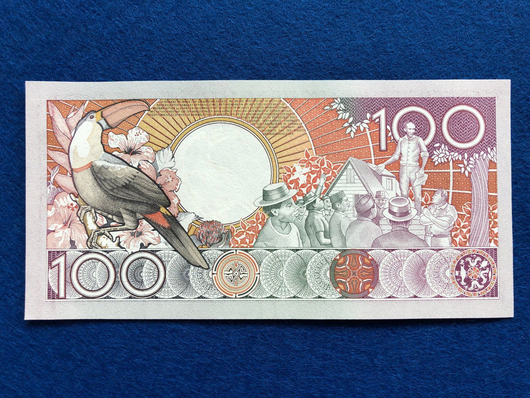 Banknoten: Suriname 1988 - 100 Gulden UNC – Neu und originalverpackt aus Pfäffikon SZ von Sieben77 1