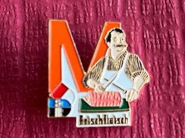 Migros Pin