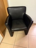 Schwarze Sessel