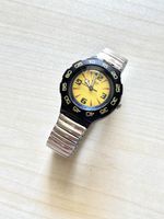 Swatch Uhr Gelb Zifferblatt Schwarz Lünette Metallband Unise