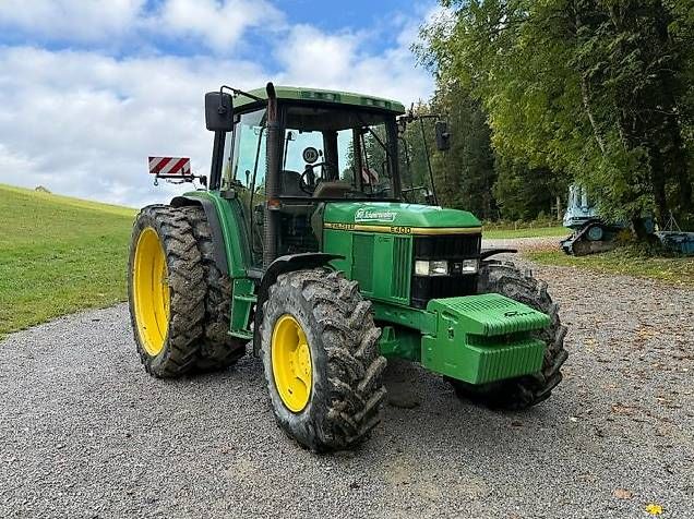 Trattori: John Deere 6400 – Usato da Oberhofen Thun'see venduto da Tranchet-Trading