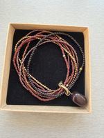 NIRMALARMBAND mit Granat-Edelstein