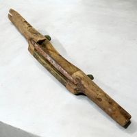 Rabot grattoir ancien en bois avec lame convexe