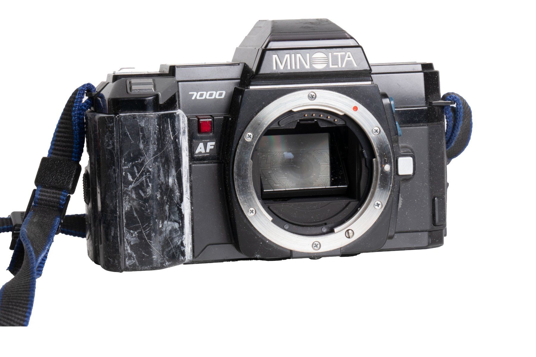 Minolta Fotocamera: Minolta 7000 AF Kamera – Difettoso da Emmen venduto da chromaton