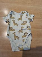 Body kurzarm mit Giraffen und Löwen Grösse 68 guter Zustand 