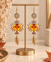 Boucle d’oreille artistique “ COEUR DE CYGNE SYMÉTRIQUE “