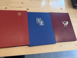 3 Briefmarkenalben teilweise gefüllt