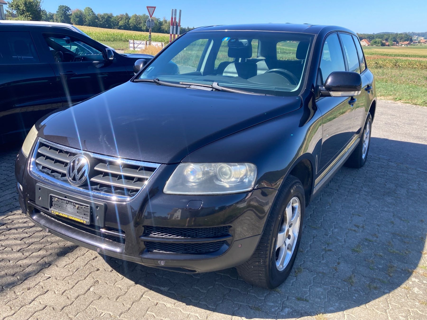 VW Autos: VW Touareg 3.0 TDI – Gebraucht aus Messen von Auktion-85 1