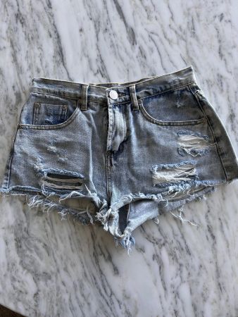 Distressed denim shorts