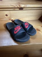 Claquettes Nike
