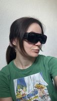 Lunettes de soleil oversize noires à verres relevables 