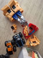 Spielzeug Roboter und Monstertrucks usw