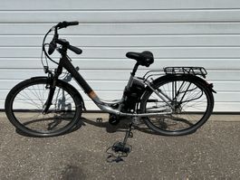 Prophete Alu City E-Bike Mittelmotor und Tiefeneinsteiger