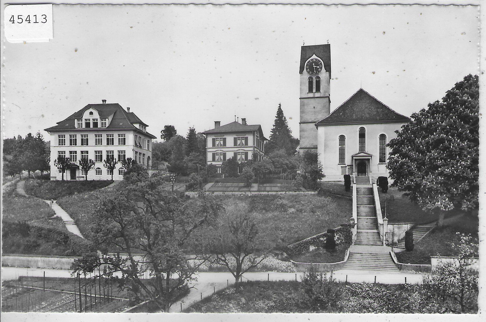 Cartoline postali: Hinwil - Kirche mit Schulhaus – Usato da Ettingen venduto da Kartenplanet