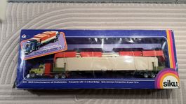 Siku 4013, MACK Schwertransporter mit Strassenbrücke, 1:55