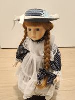 Poupée porcelaine