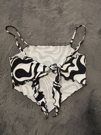 Adjustable Top with black and white print.