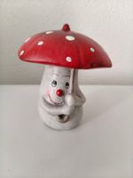 Herbstdekoration Pilz mit Gesicht