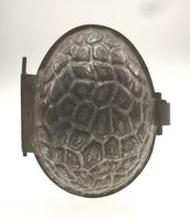 alte Schokoladenform gemustertes Osterei