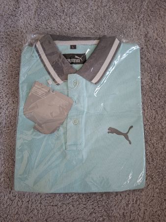 Polo PUMA bleu clair taille L 
