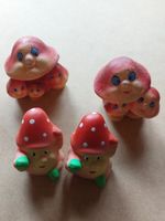 Vier niedliche Tonfiguren