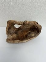 Skulpturale Holzschale aus massivem Wurzelholz mit Griff